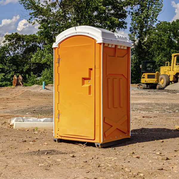 how often are the portable restrooms cleaned and serviced during a rental period in Village Shires